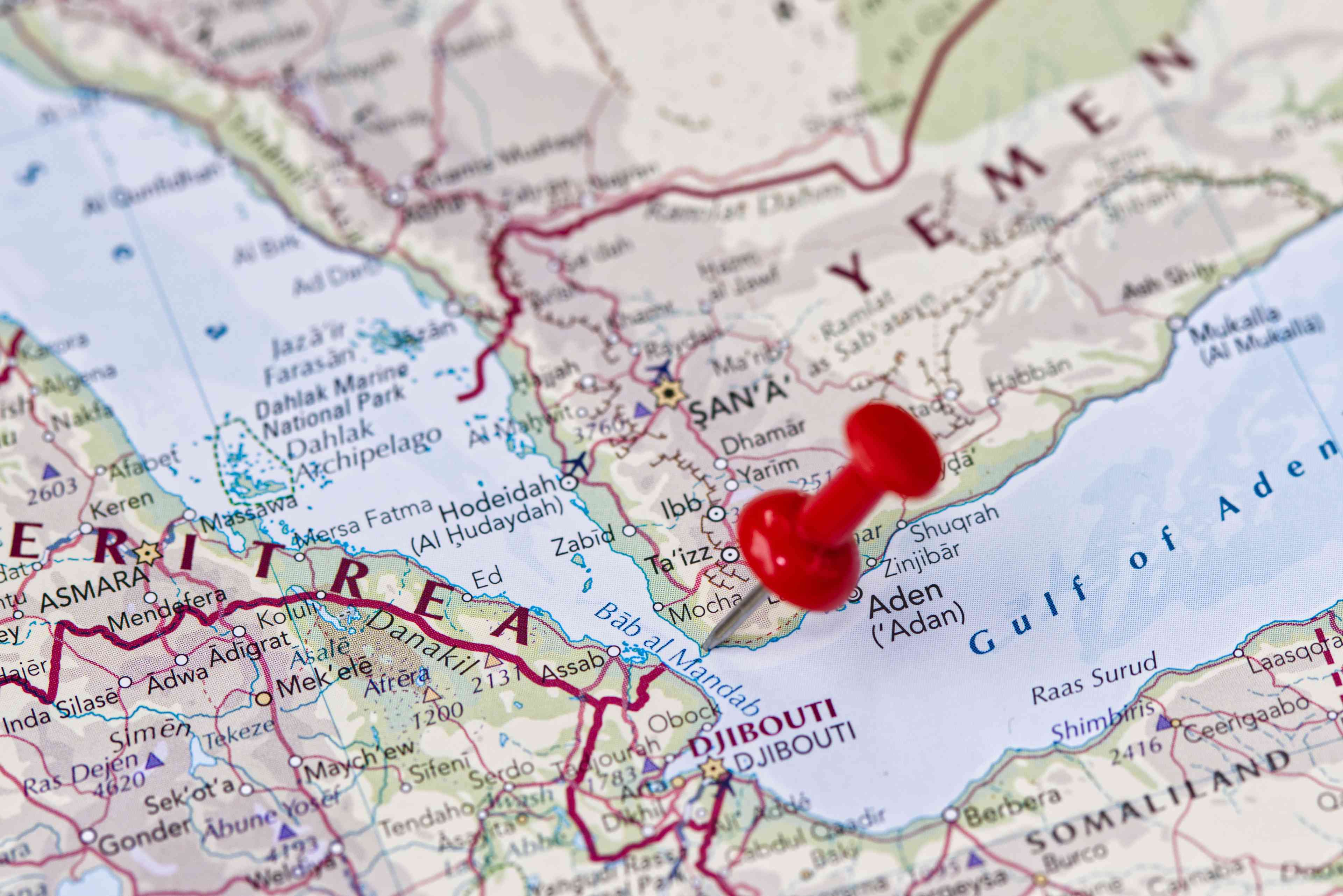 Attacks by Houthis on Red Sea shipping have led to sanctions of Houthi funding - but not their designation as terrorists. background