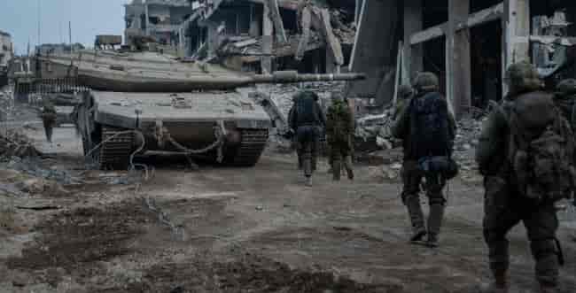IDF soldiers in Gaza background