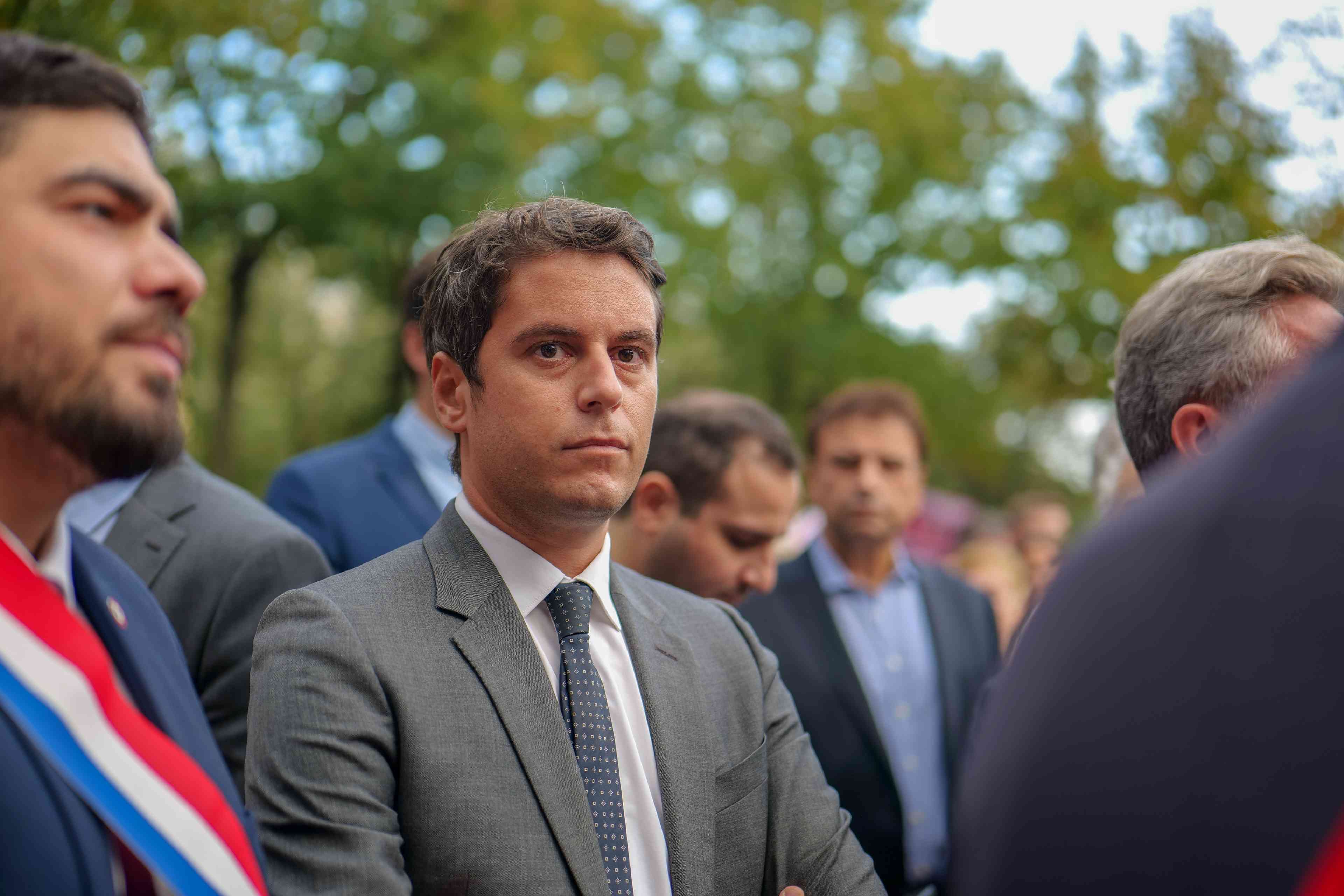 Gabriel Attal, the new Prime Minister of France. background