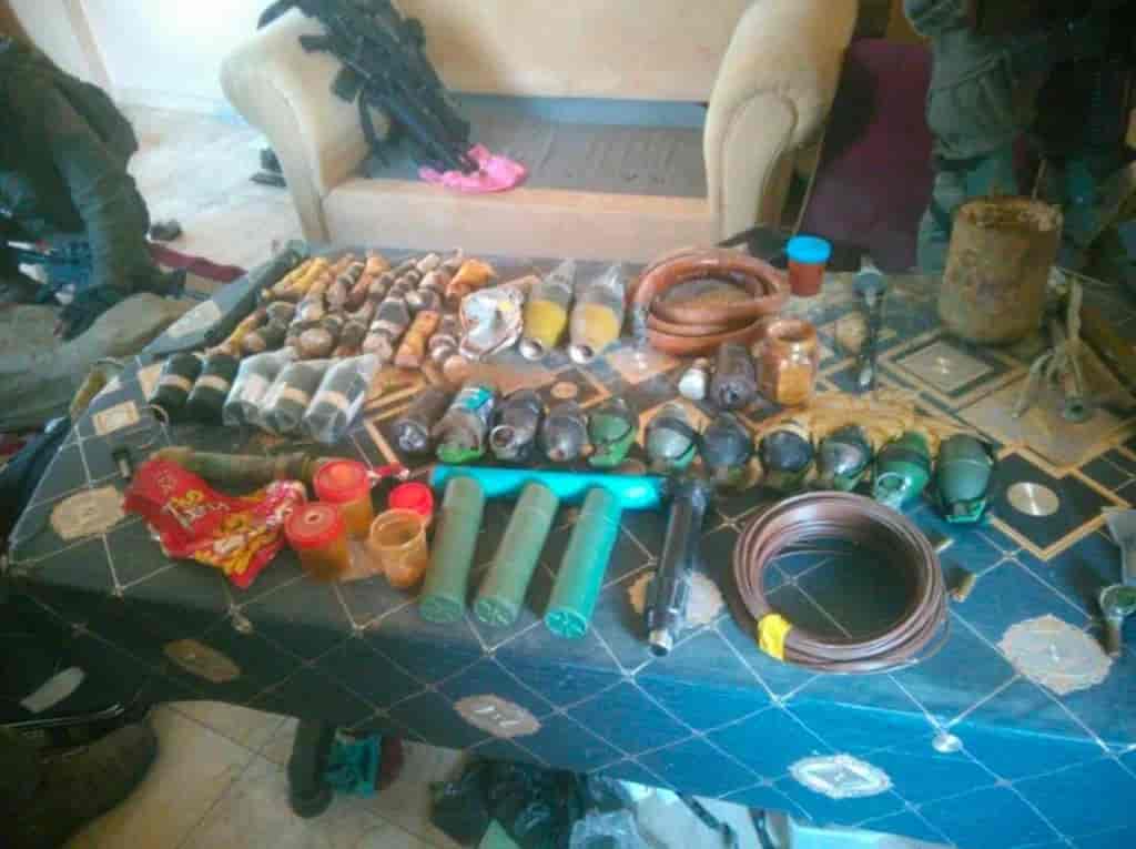 Means of warfare seized in the mosque background