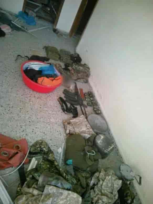 Means of warfare seized at the scene background