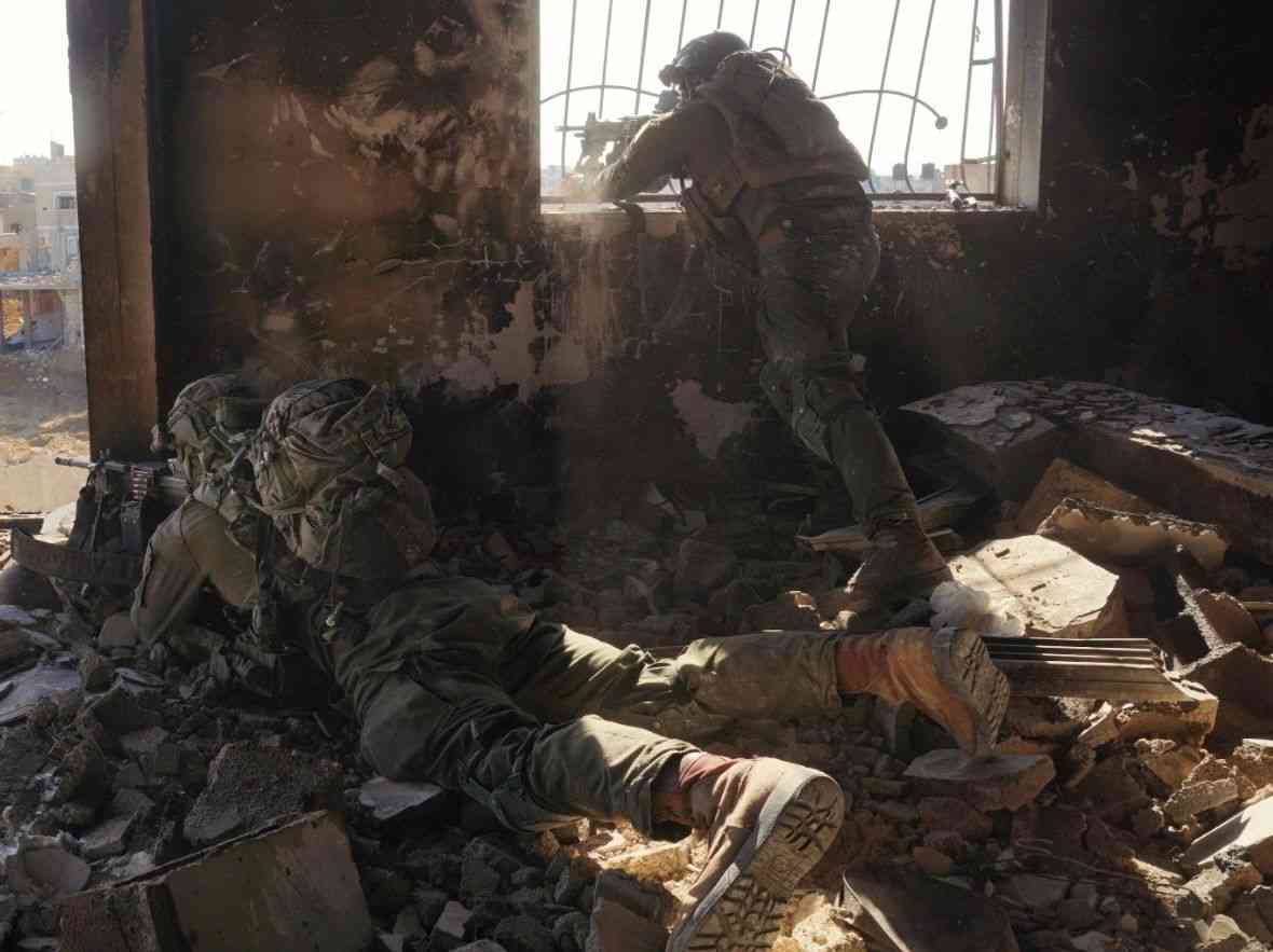 Kfir Brigade fighters operates in Khan Yunis, Gaza. background