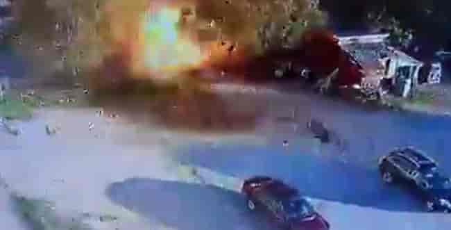 The car containing Hezbollah activists blowing up. background
