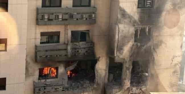 Damaged buildings in Syria background