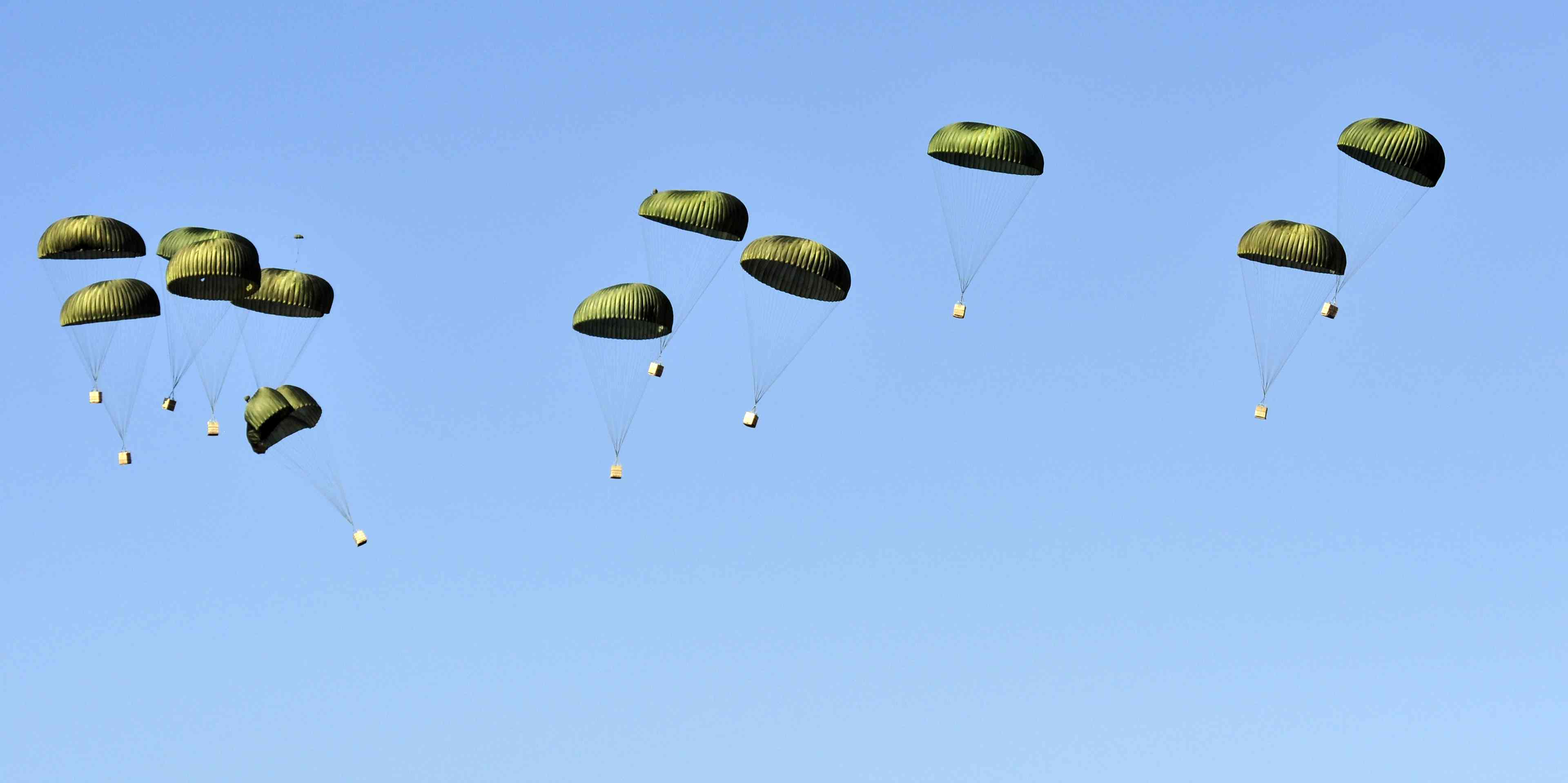 Airdropping supplies. Illustration. background