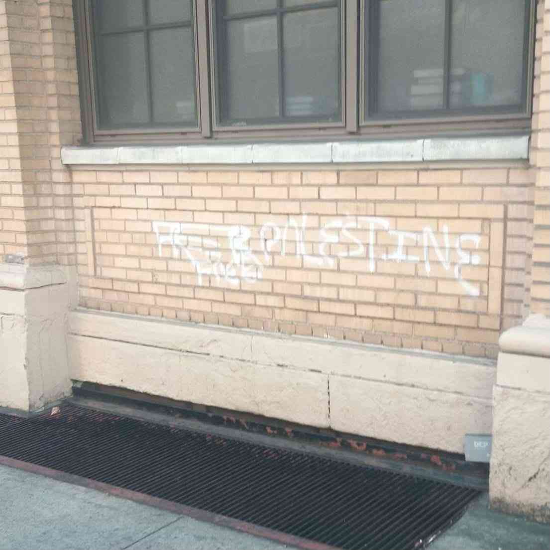 "Free Palestine" on the yeshivah walls. background
