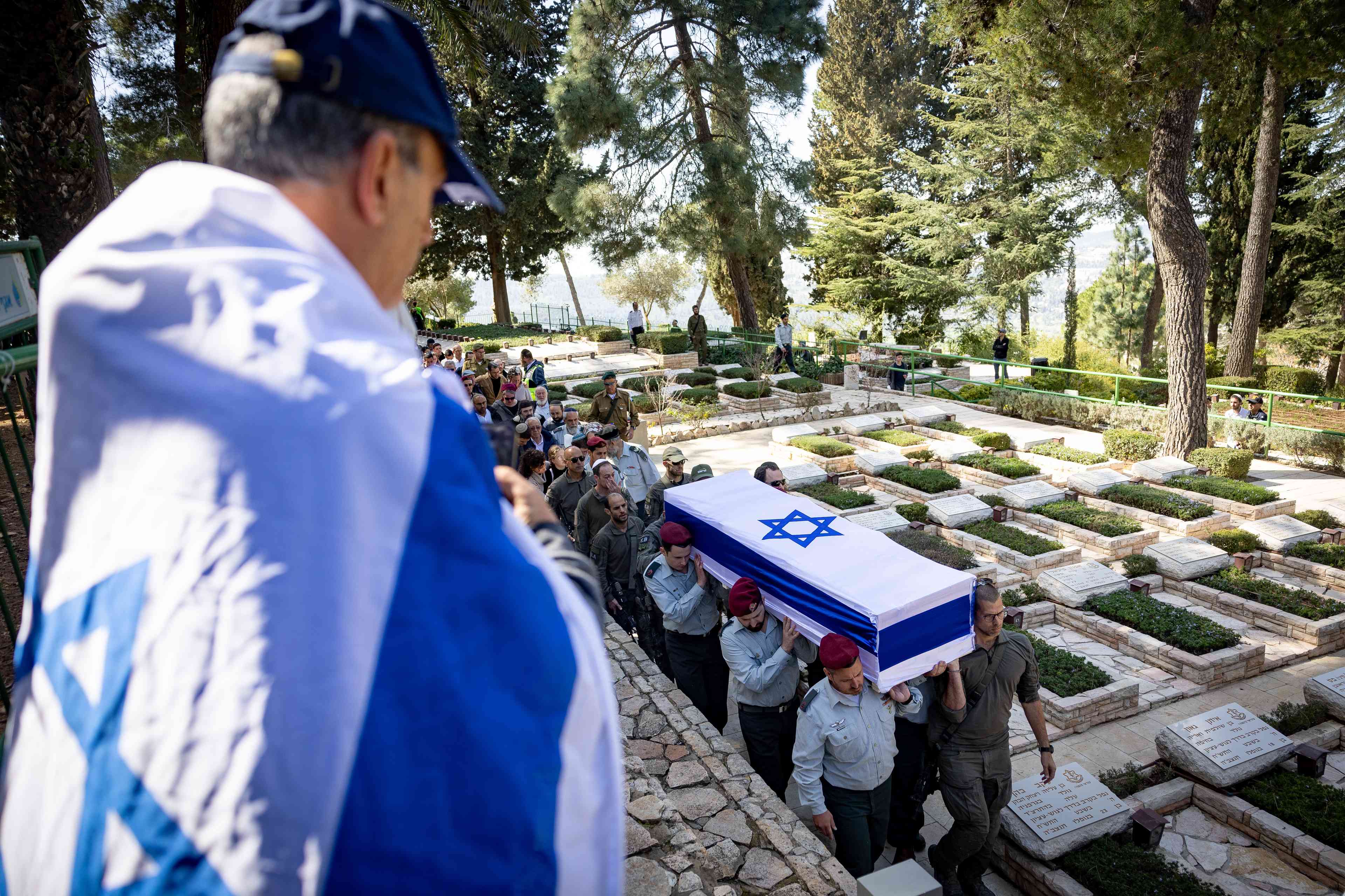 Funeral at Mount Herzl Military Cemetery. background