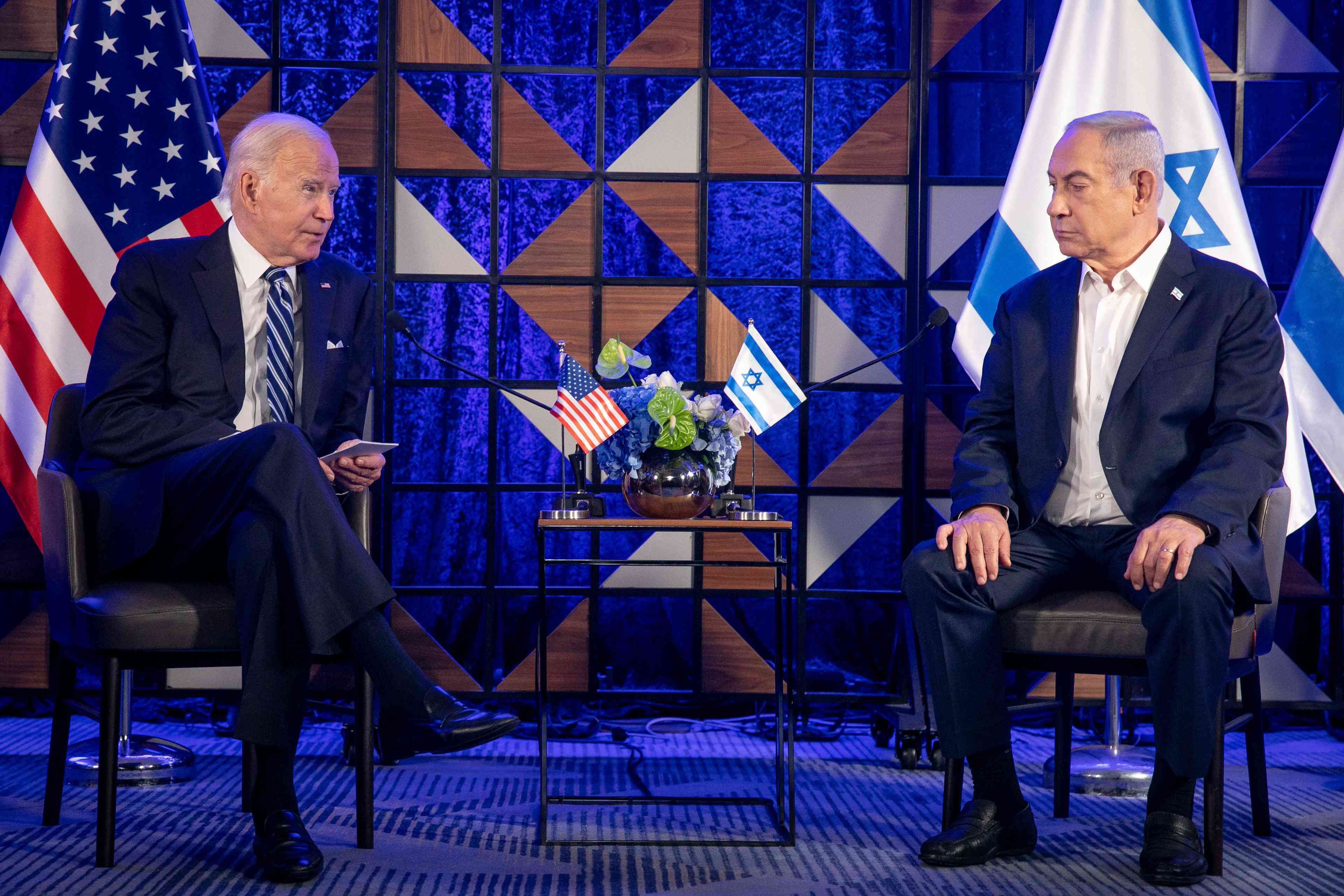 Israeli Prime Minister Benjamin Netanyahu meets with United States President Joe Biden in Tel Aviv, October 18, 2023. background