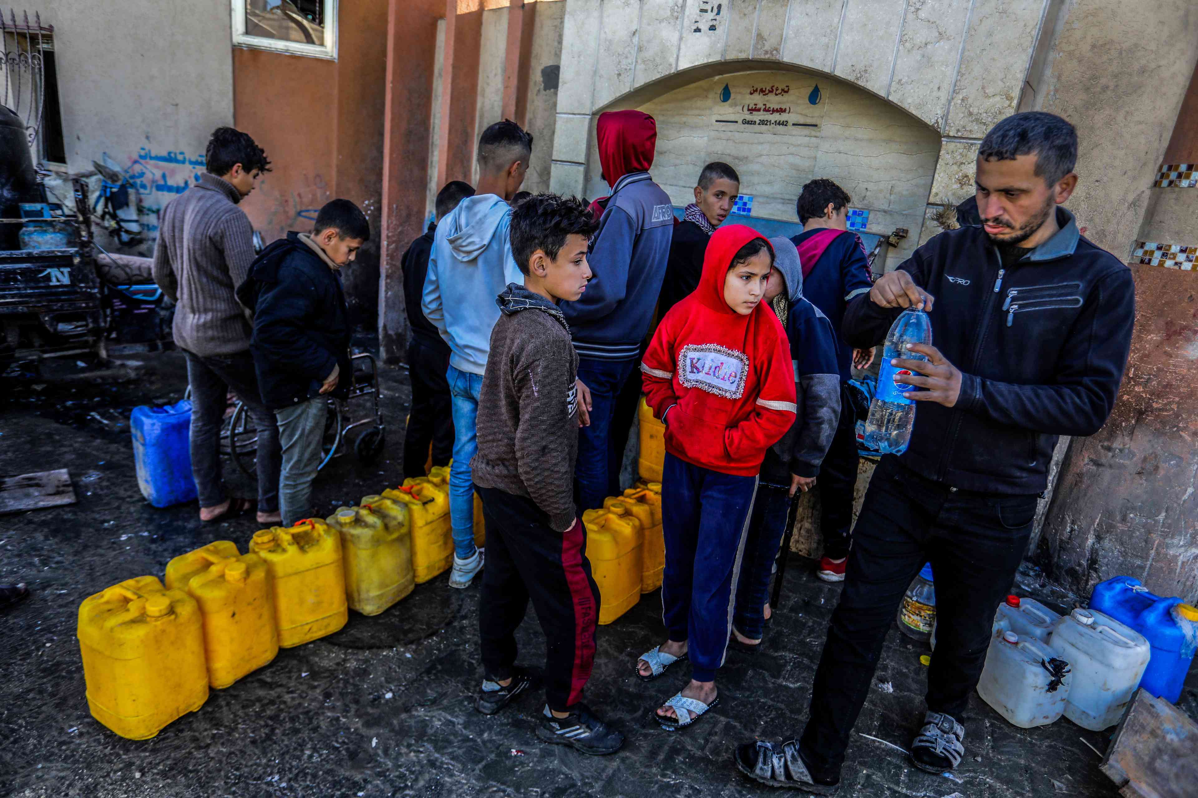 UNRWA handing out aid - and allegedly stealing it, too. background