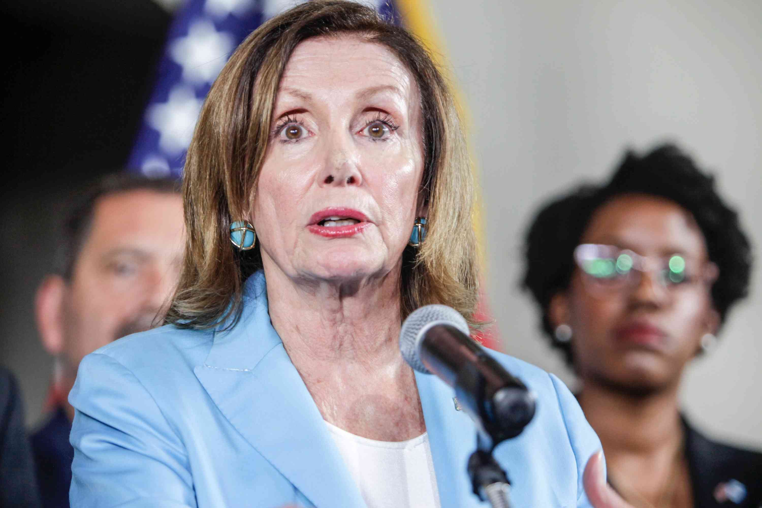 Nancy Pelosi speaks at the Air Force base during her visit to Guatemala in regard to migration policy between Guatemala and the US background