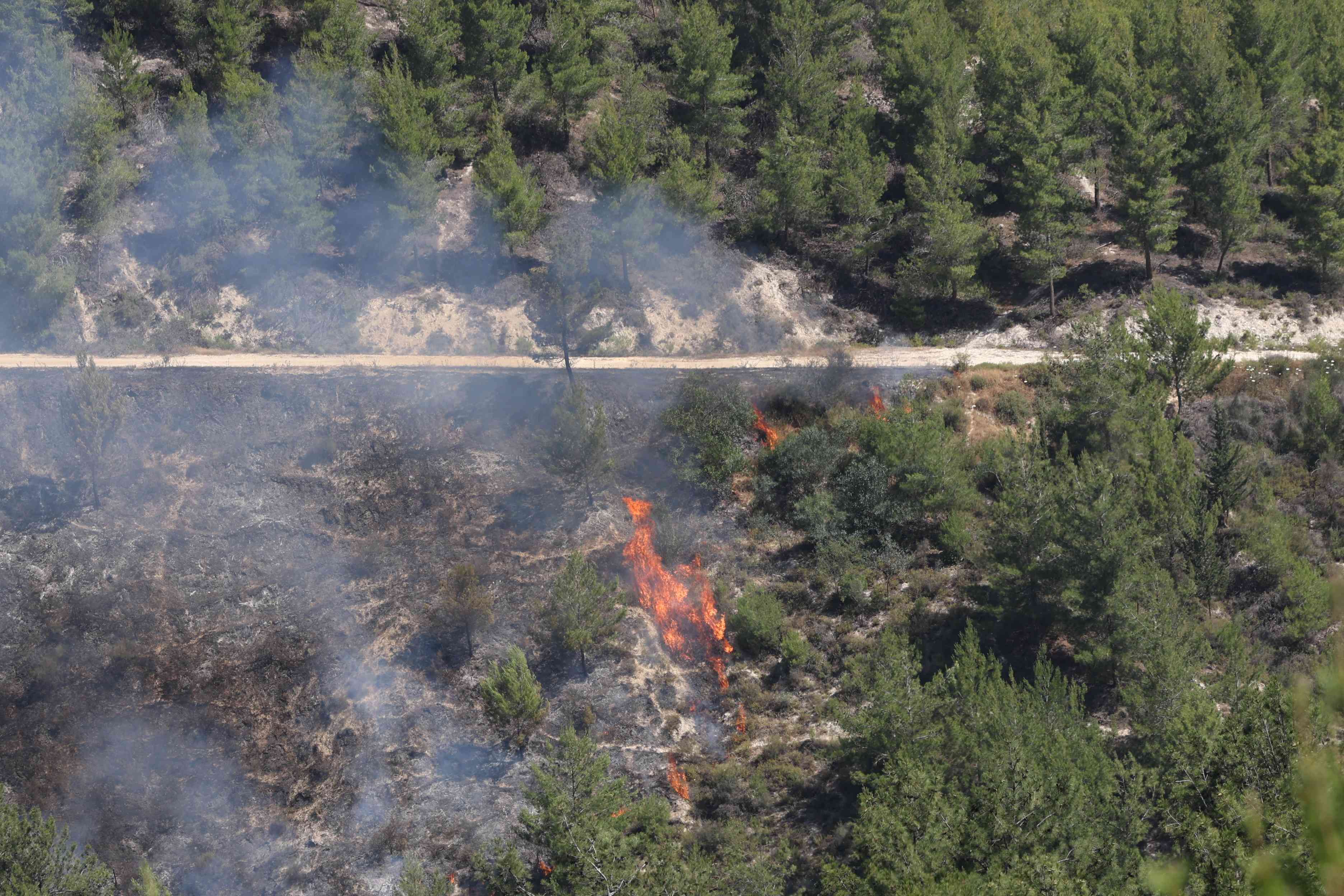 Fire caused by Hezbollah projectiles. Illustration. background