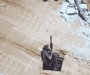 Terrorist trying to attack IDF soldiers from underground. background