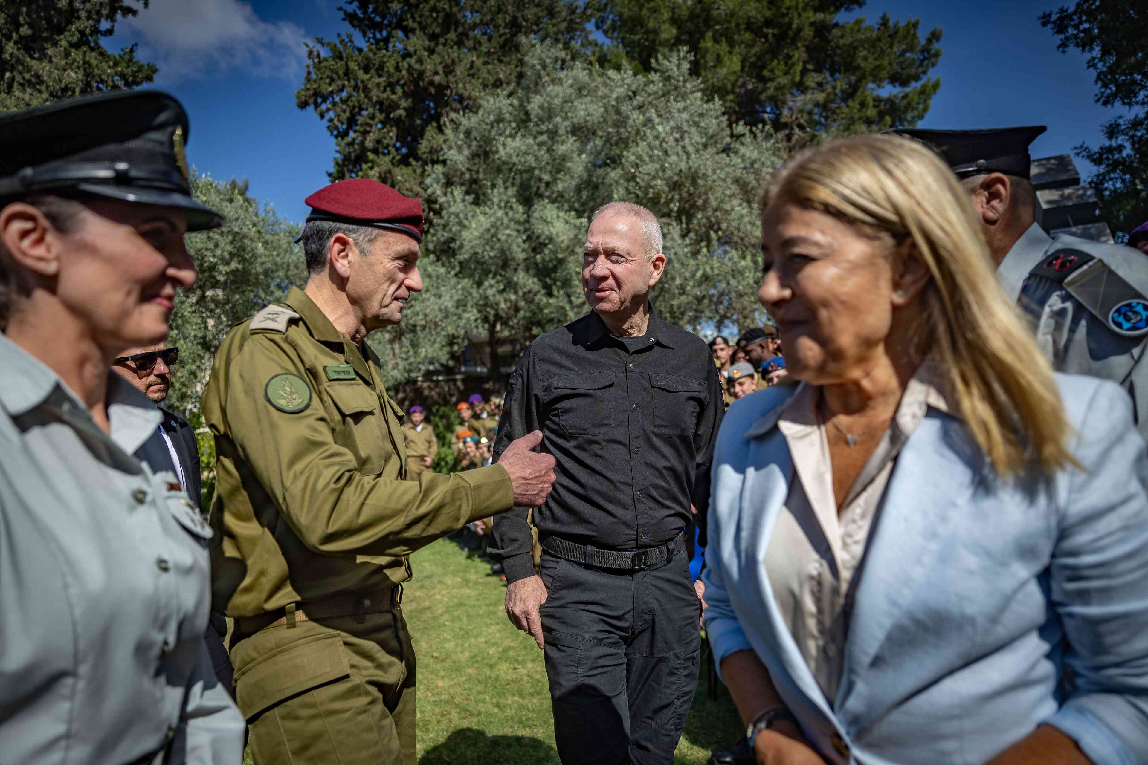 Yoav Gallant meets with military personnel  background