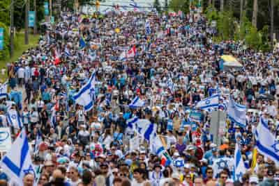 Tens of thousands attend a rally in support of Israel, in Toronto, Canada. June 9, 2024. background