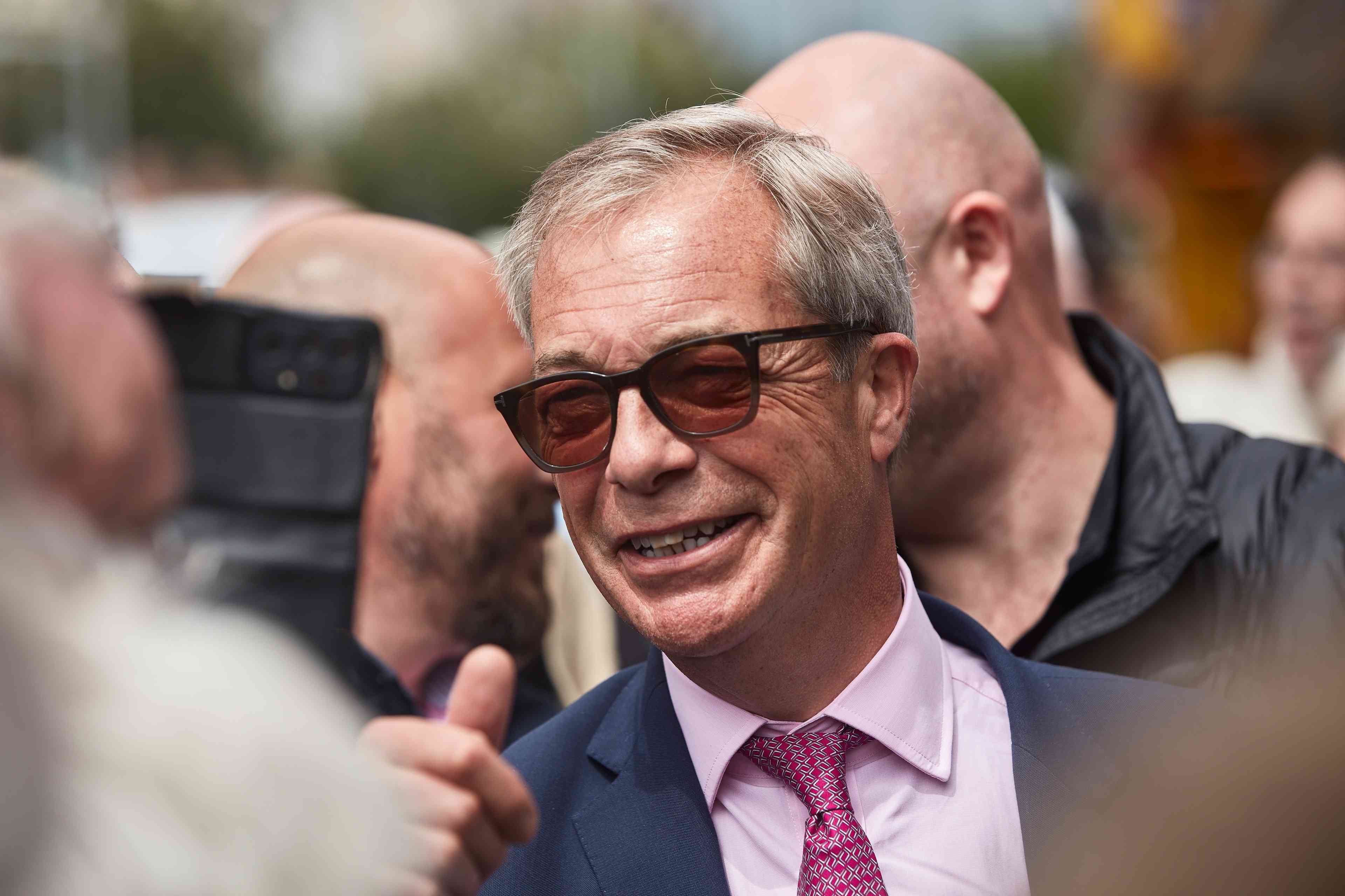 The new leader of the British right? Nigel Farage. background