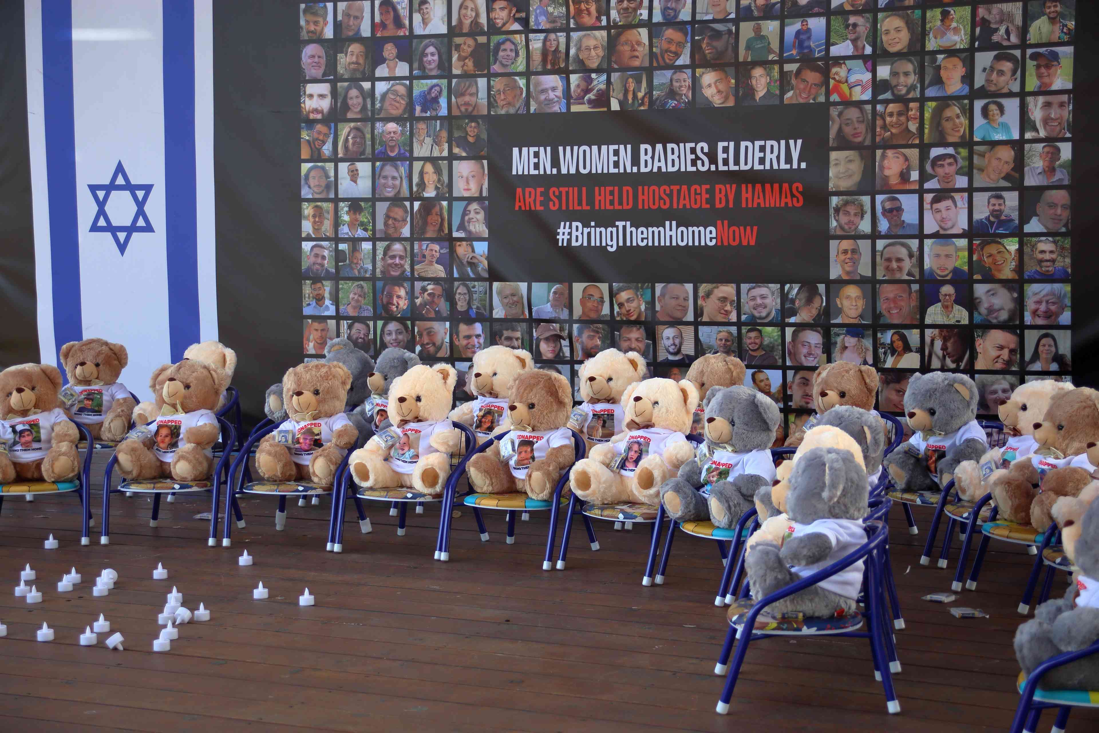 Street installation - the sign of solidarity and a reminder of Israeli children, adults and elderly people kidnapped and taken hostage by Hamas, Netanya, Israel, November 5th 2023. background