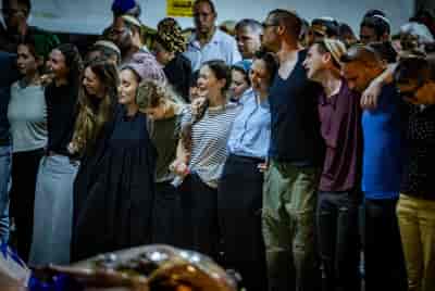 Family and friends of Israeli soldier Senior Staff Sergeant Major Elon Waiss attend his funeral at the Mount Herzl Military Cemetery in Jerusalem on June 16, 2024.   background