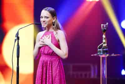 Israeli actress Shira Haas receives the prize for Best Supporting Actress at the Ophir Awards ceremony, Ashdod.  background