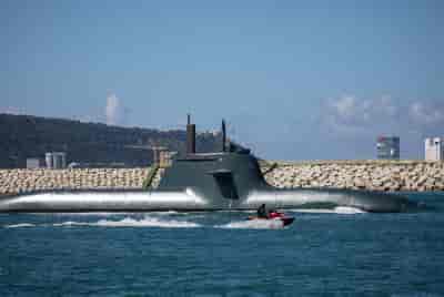 Submarine in the water off the coast of Haifa background