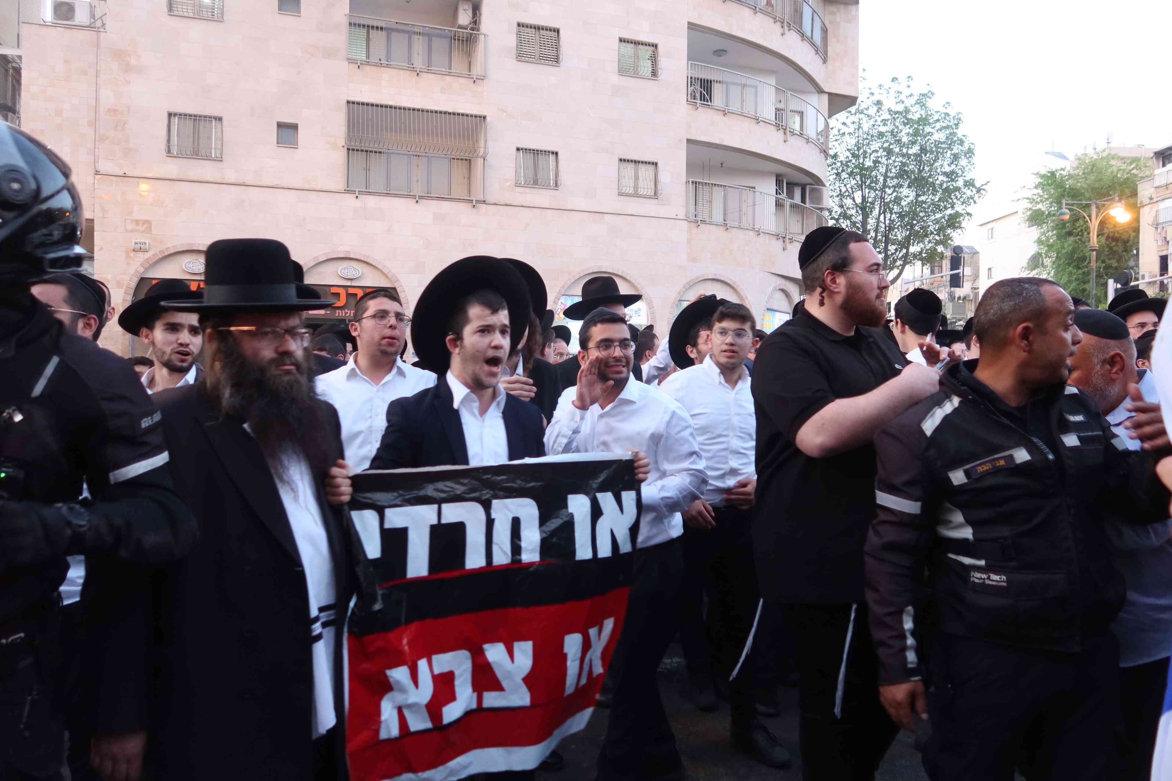 Demonstration and confrontation between leftists and ultra-orthodox regarding the recruitment to the IDF, Bnei Brak Israel, 2024. background