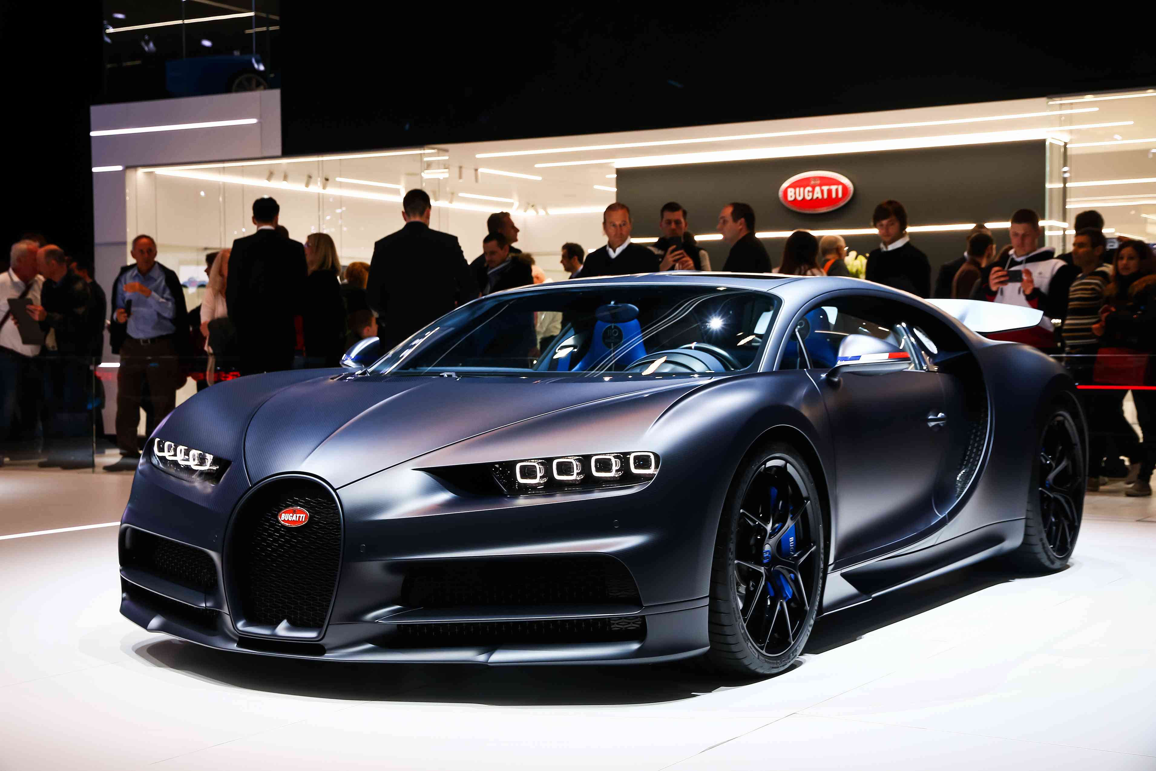March 11, 2019: Luxury hypercar 110 Ans Bugatti presented at the annual Geneva International Motor Show 2019. background