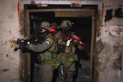 Combat soldiers of the elite IDF Yahalom unit at a training session in the Adam Military training facility. background