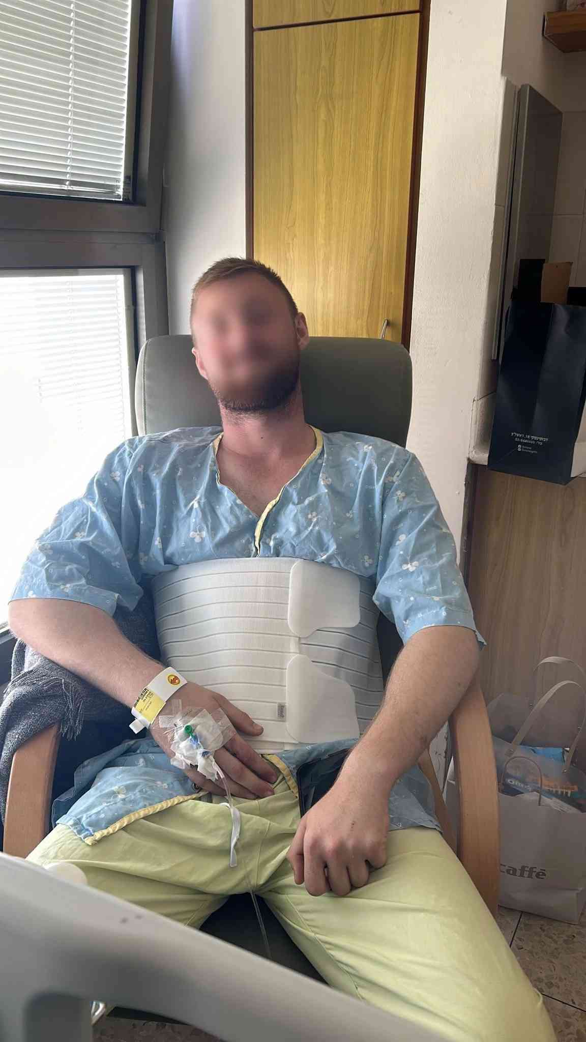 Hero soldier, injured while saving his comrade, recovers background