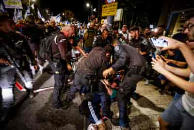 Demonstrators protest against Prime Minister Benjamin Netanyahu, the current Israeli government and for the release of hostages. Jerusalem, June 29, 2024.  background