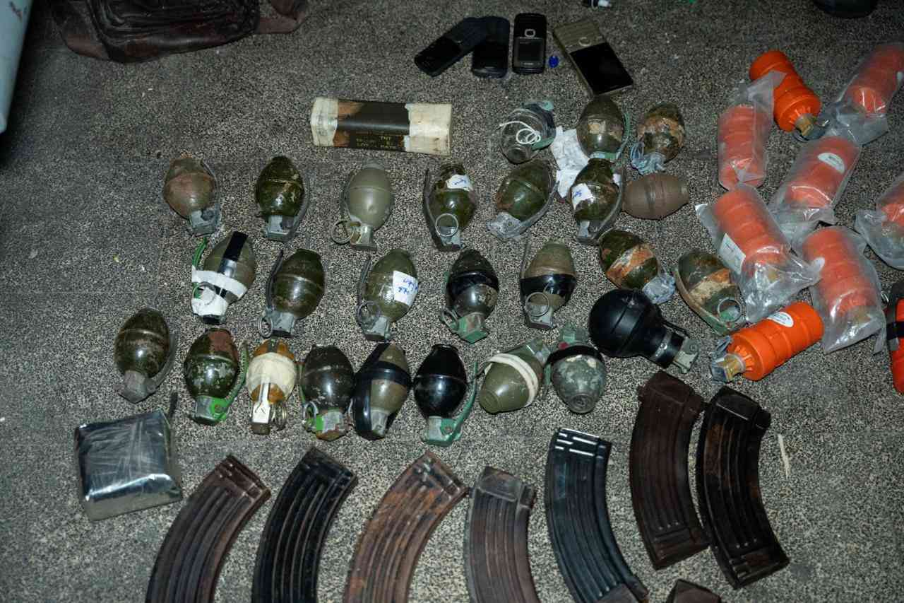 Weapons found in humanitarian shelter. background
