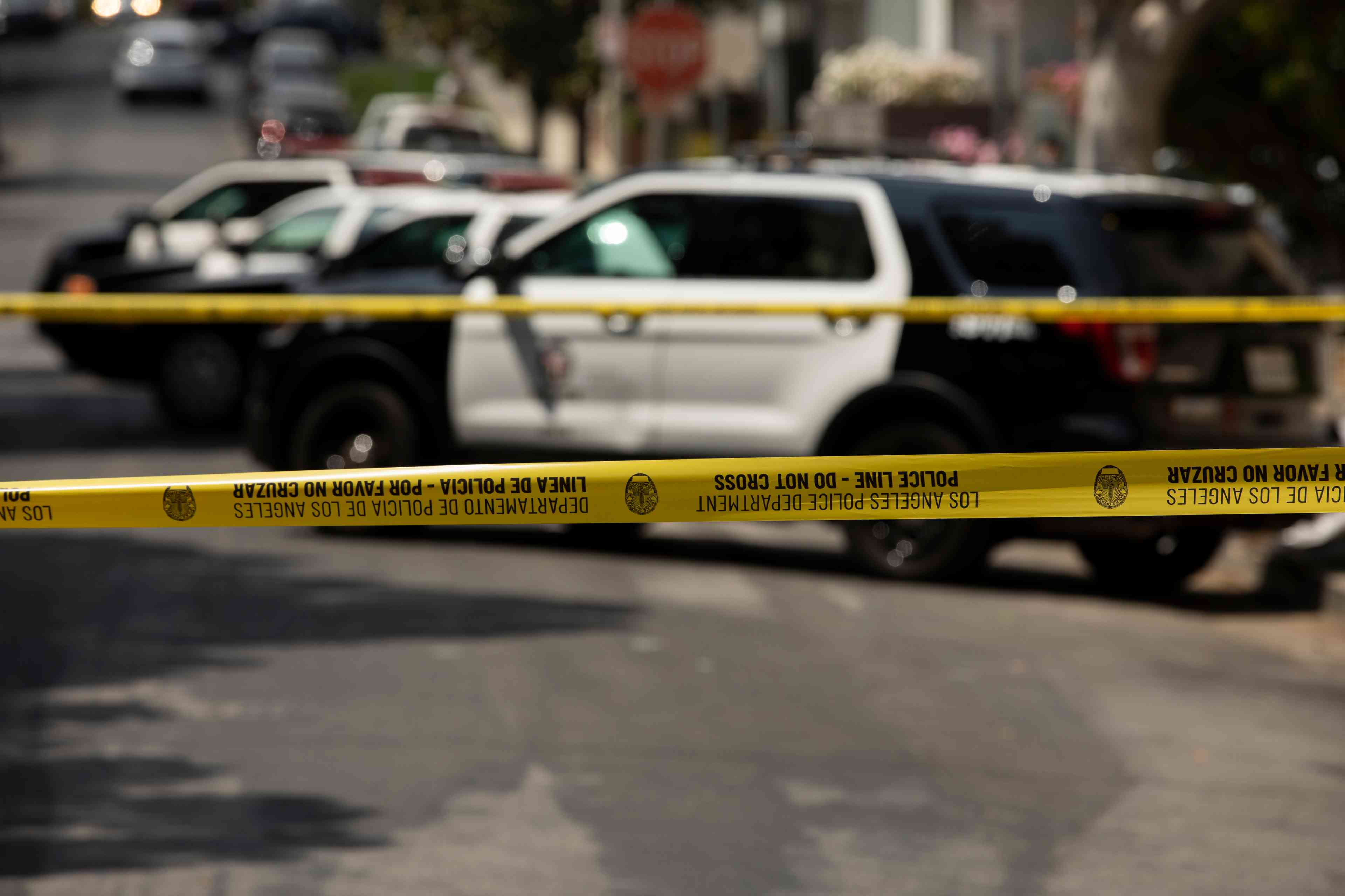Cordon tape secures the scene of a crime background
