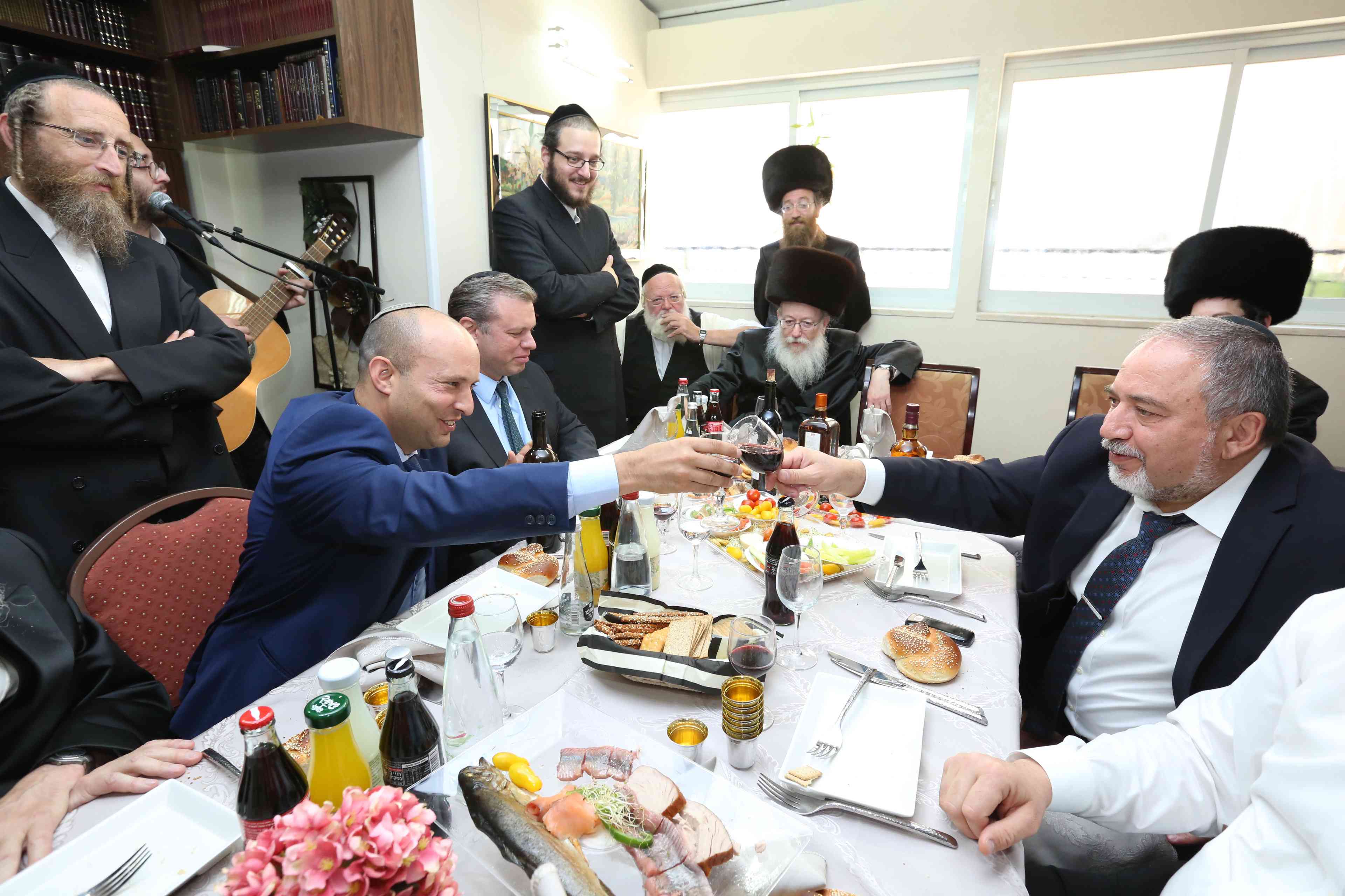 Bennet and Liberman in friendlier days. background