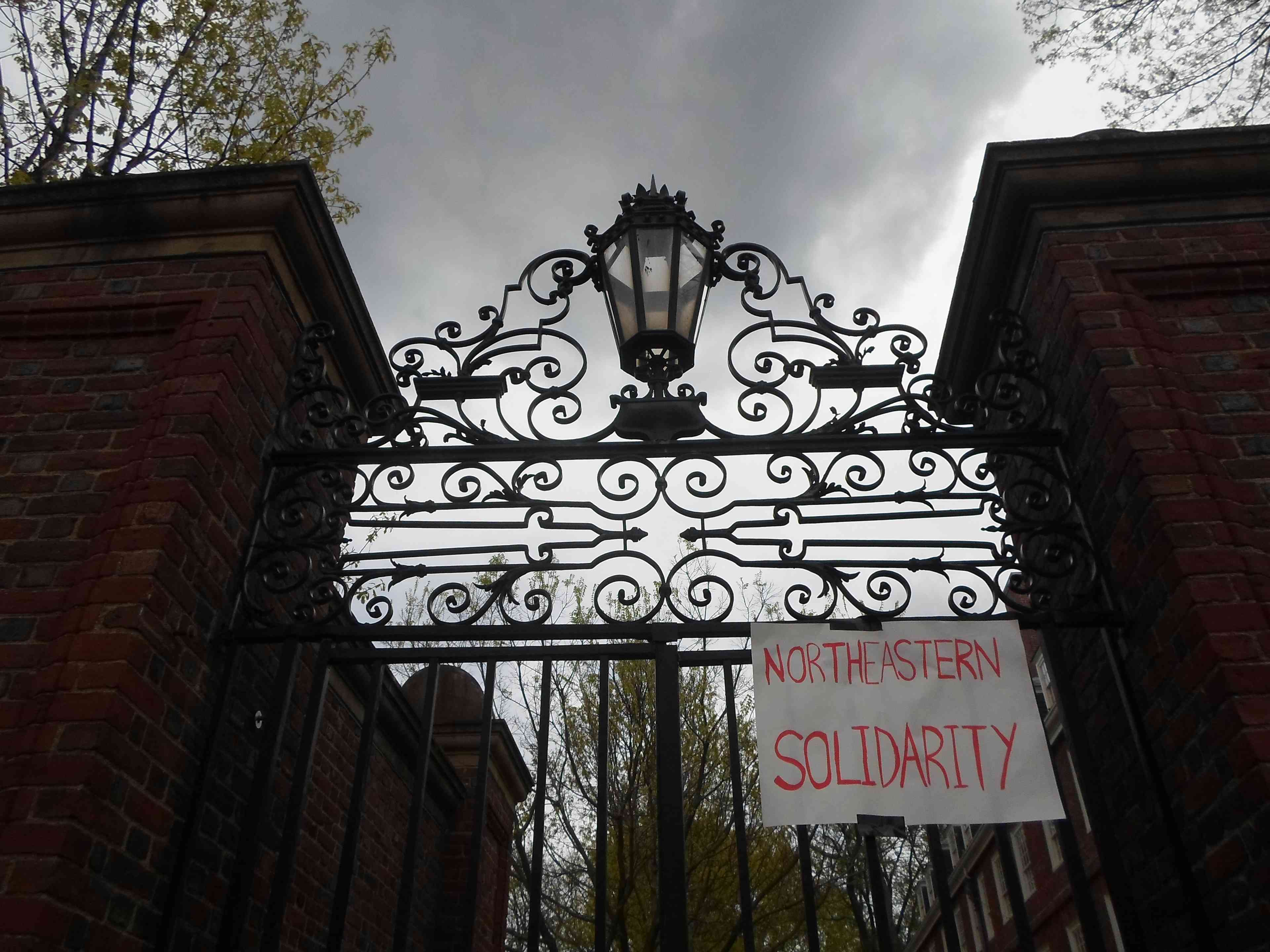 ro-Palestine protest encampments at Harvard Yard calling for Harvard University divestment from Israel background