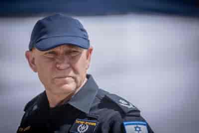 Police deputy commissioner Avshalom Peled at the Western Wall background