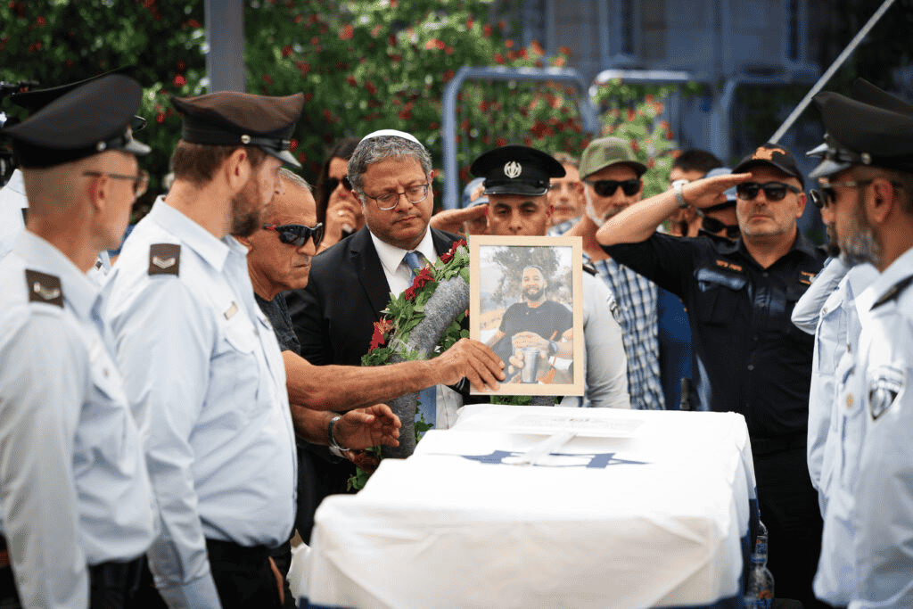 Funeral of Yochai Avni background