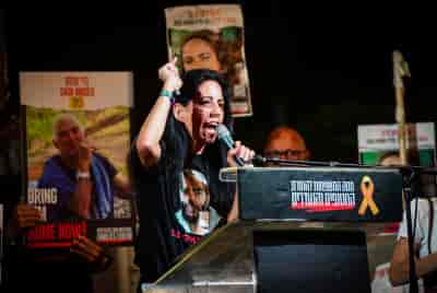 Einav Zangauker, the mother of hostage Matan Zangauker during a rally calling for the release of Israelis held hostage by Hamas background