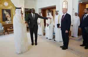 Foreign Secretary David Lammy with Qatari leaders. background