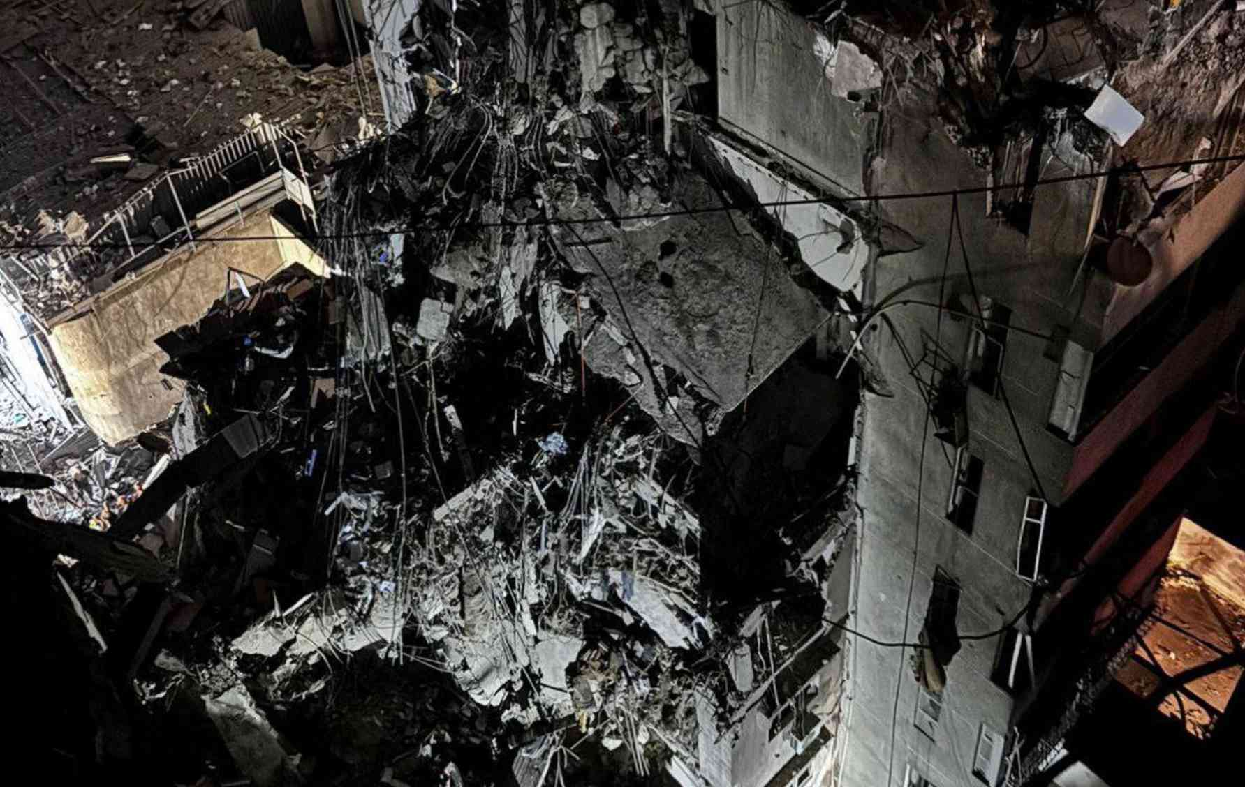 Rubble of the building in which Fouad Shukr was assassinated background