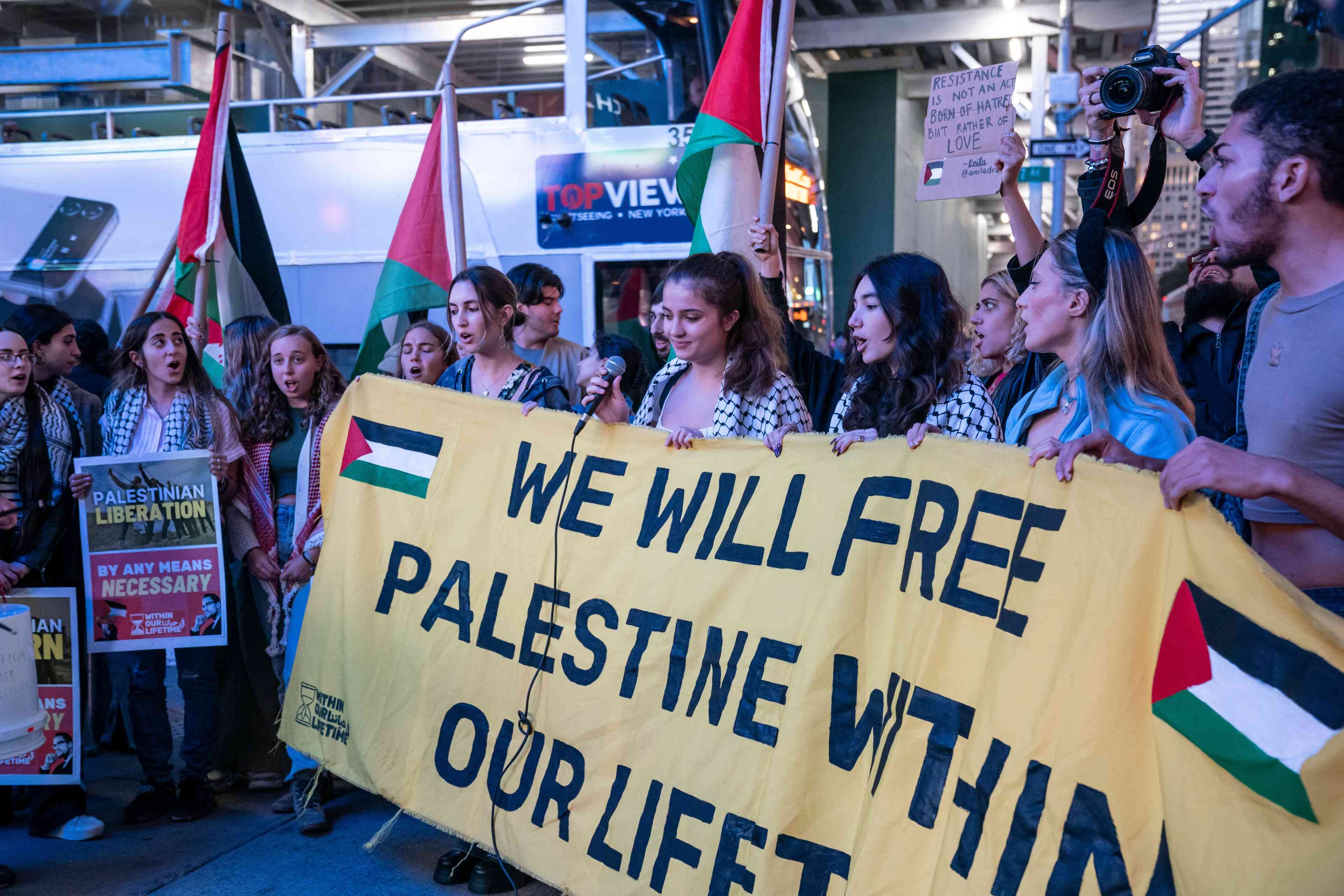 Pro-Palestinian protest in Times Square background