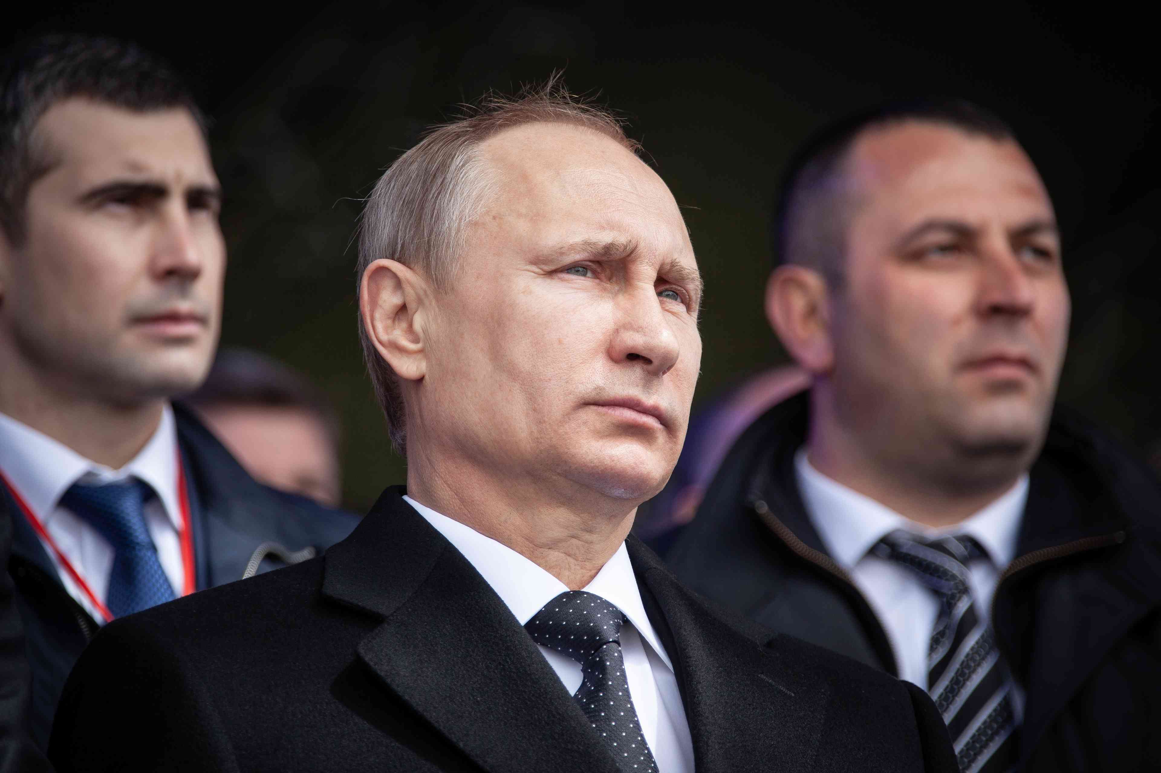 Russian President Vladimir Putin. background