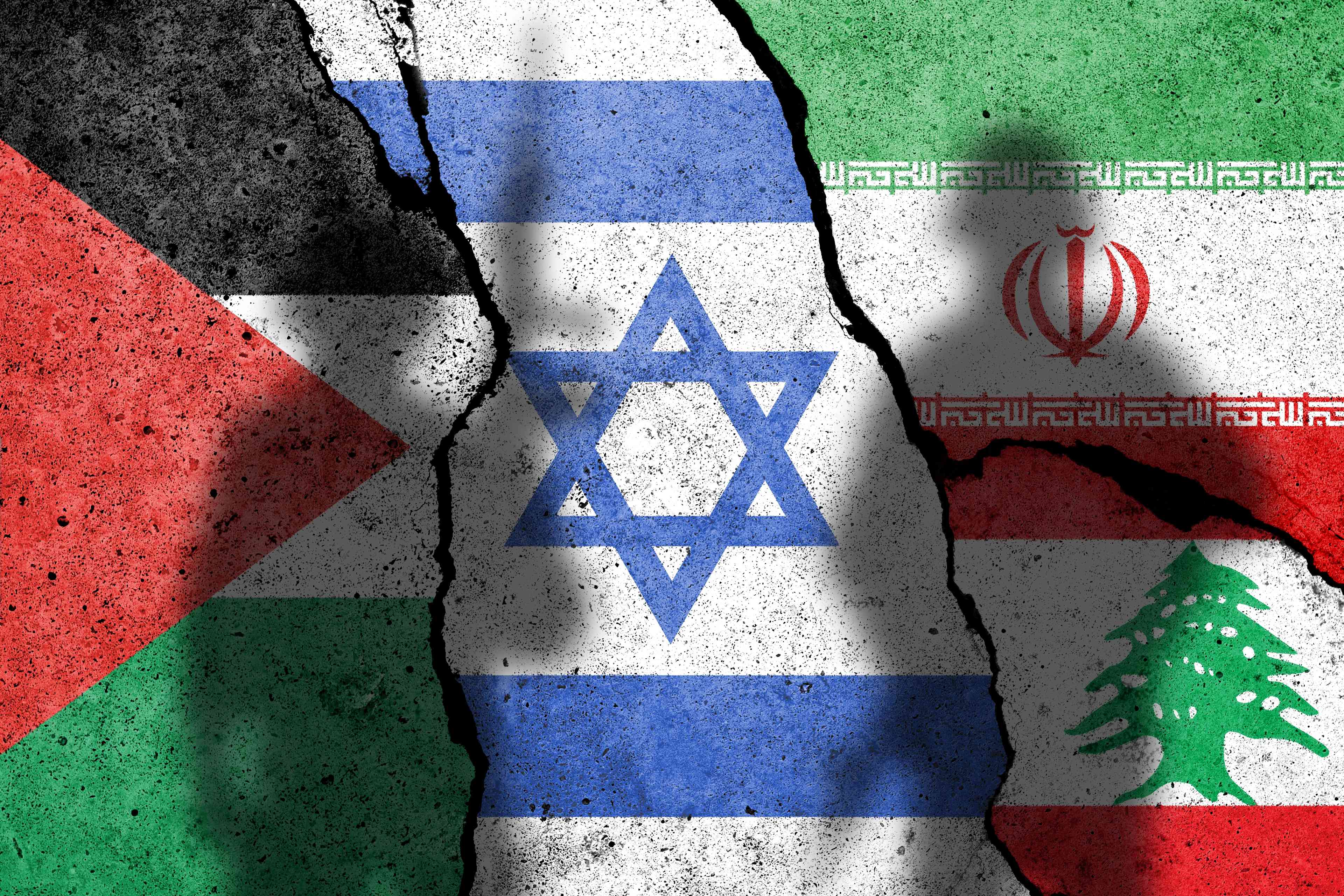 Flag of Palestine, Israel, Iran and Lebanon painted on the concrete wall with soldiers. background