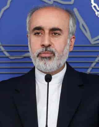 Iranian Foreign Ministry Spokesperson Nasser Kanaani. background