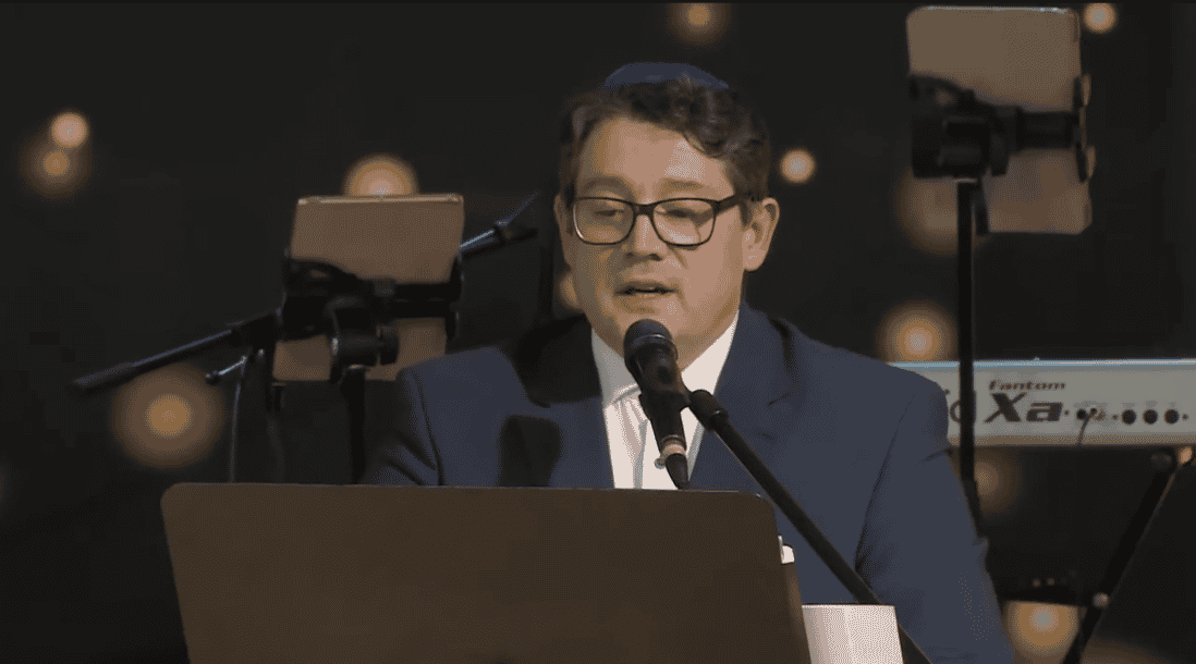 Cantor Nikola David appears in a 2018 performance. background