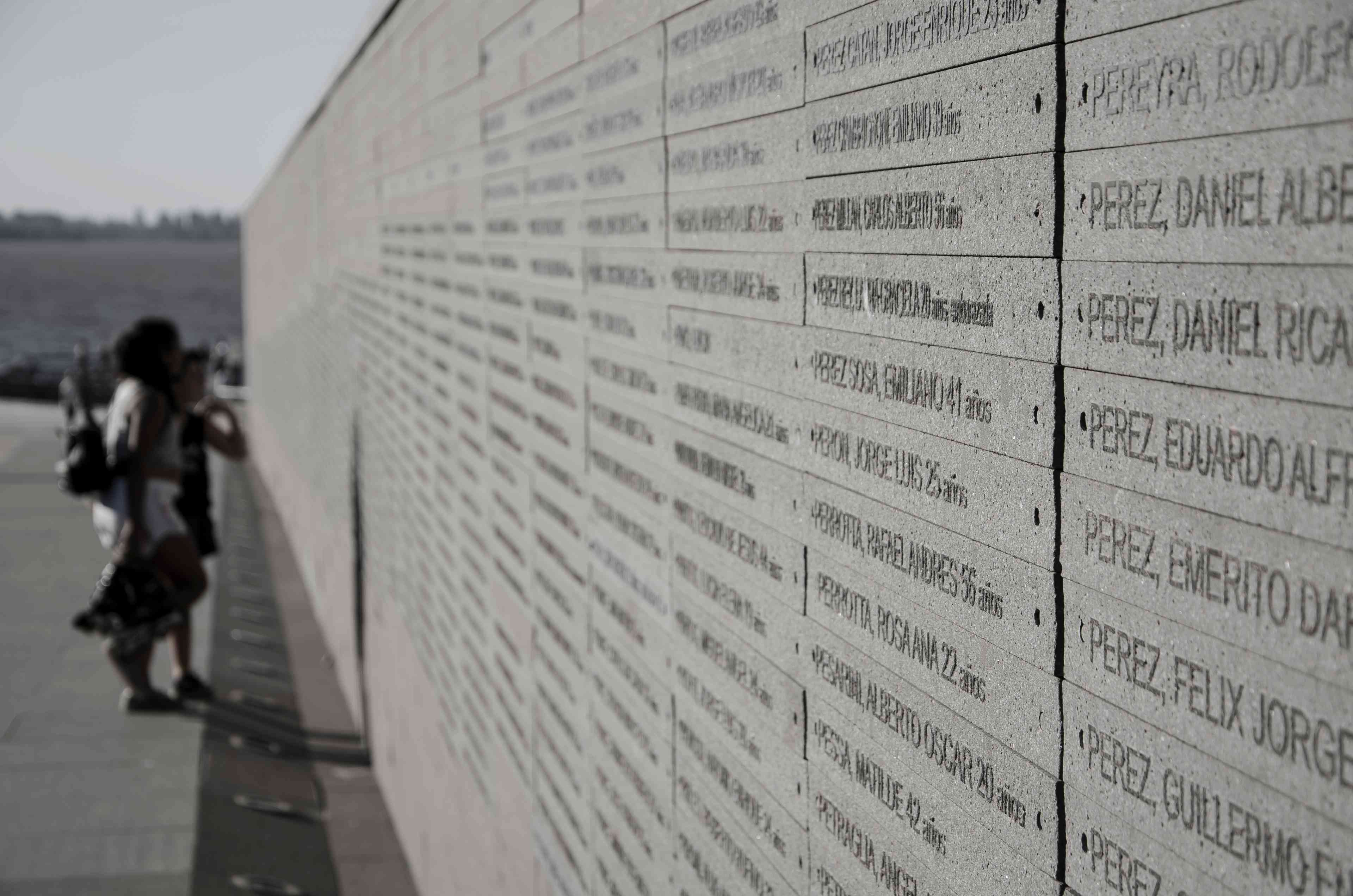 Monument to the victims of terrorist attack in Buenos Aires background