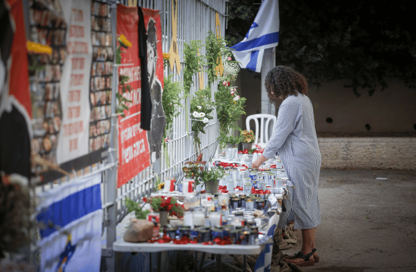 People gather in memory of Israeli-American hostage Hersh Goldberg-Polin in Jerusalem, September 1, 2024. background