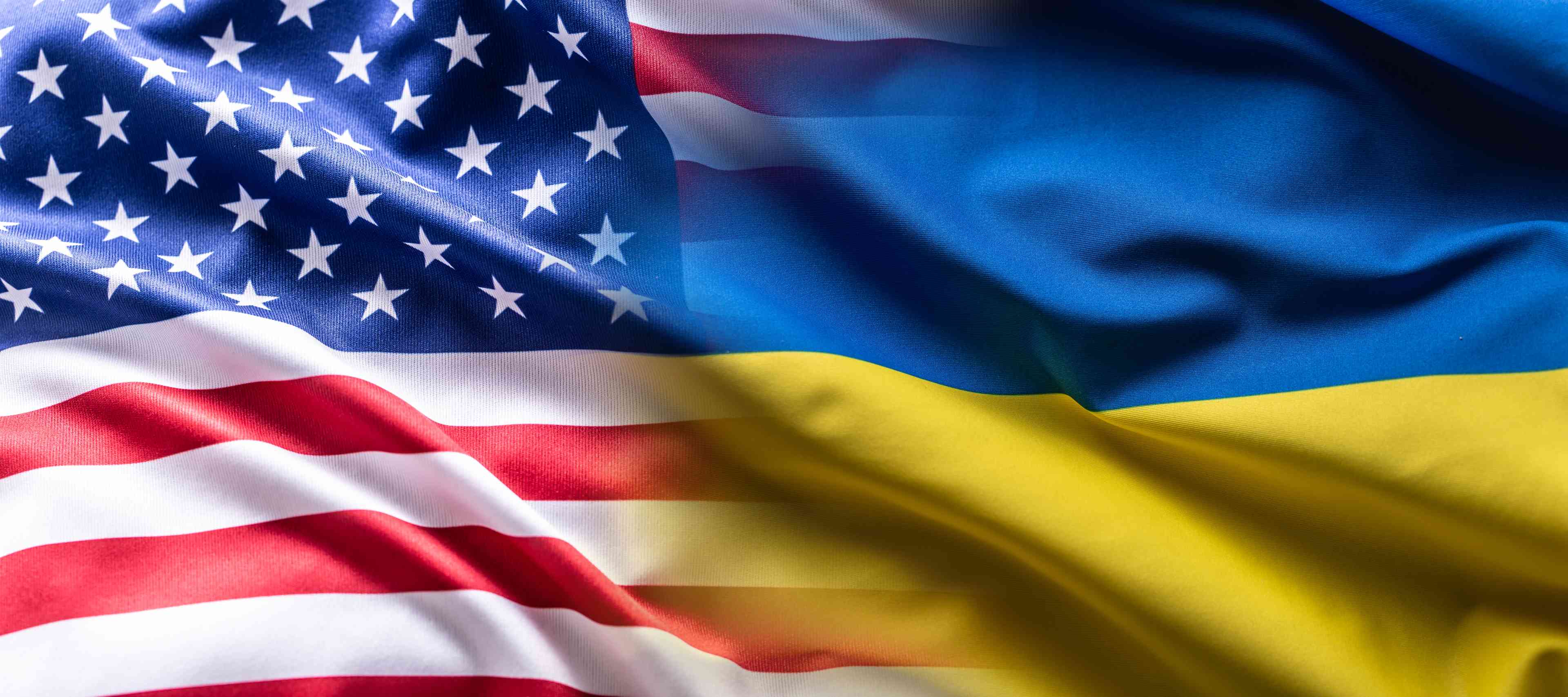 US and Ukrainian flags background