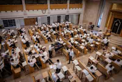Yeshiva students study at the Kamenitz Yeshiva, in Jerusalem on August 22, 2023