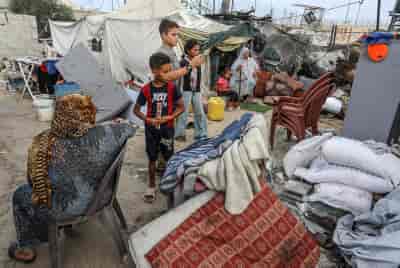 Palestinians from Rafah near Asdaa prison in Khan Yunis, in the southern Gaza Strip, on September 3, 2024 background
