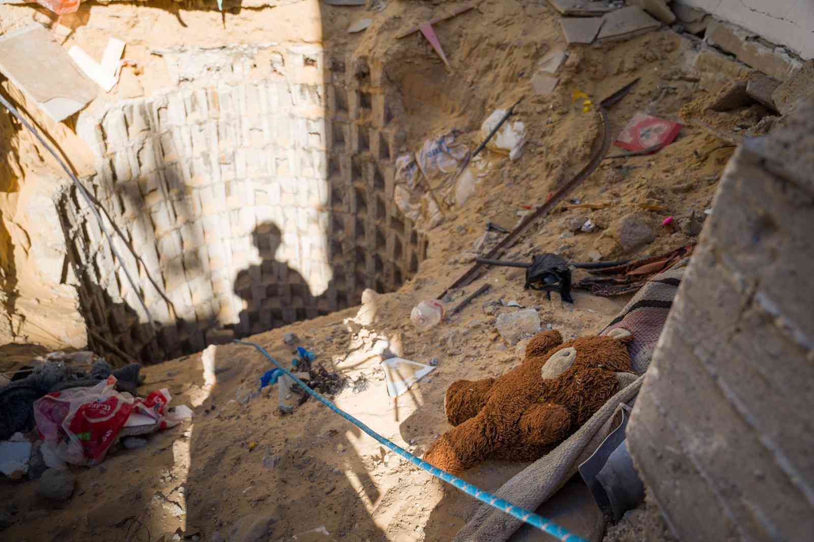 Shaft leading to tunnel where the six hostages were held. background