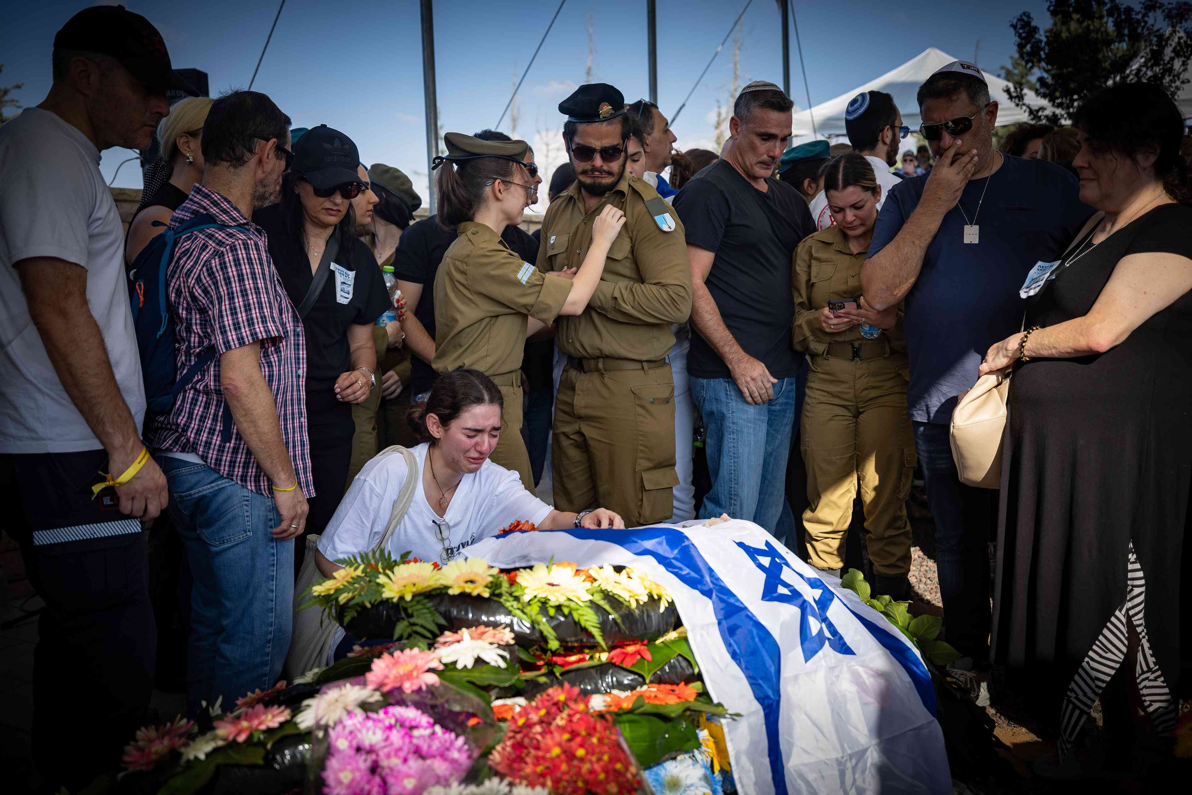 Funeral of Noa Marciano. background