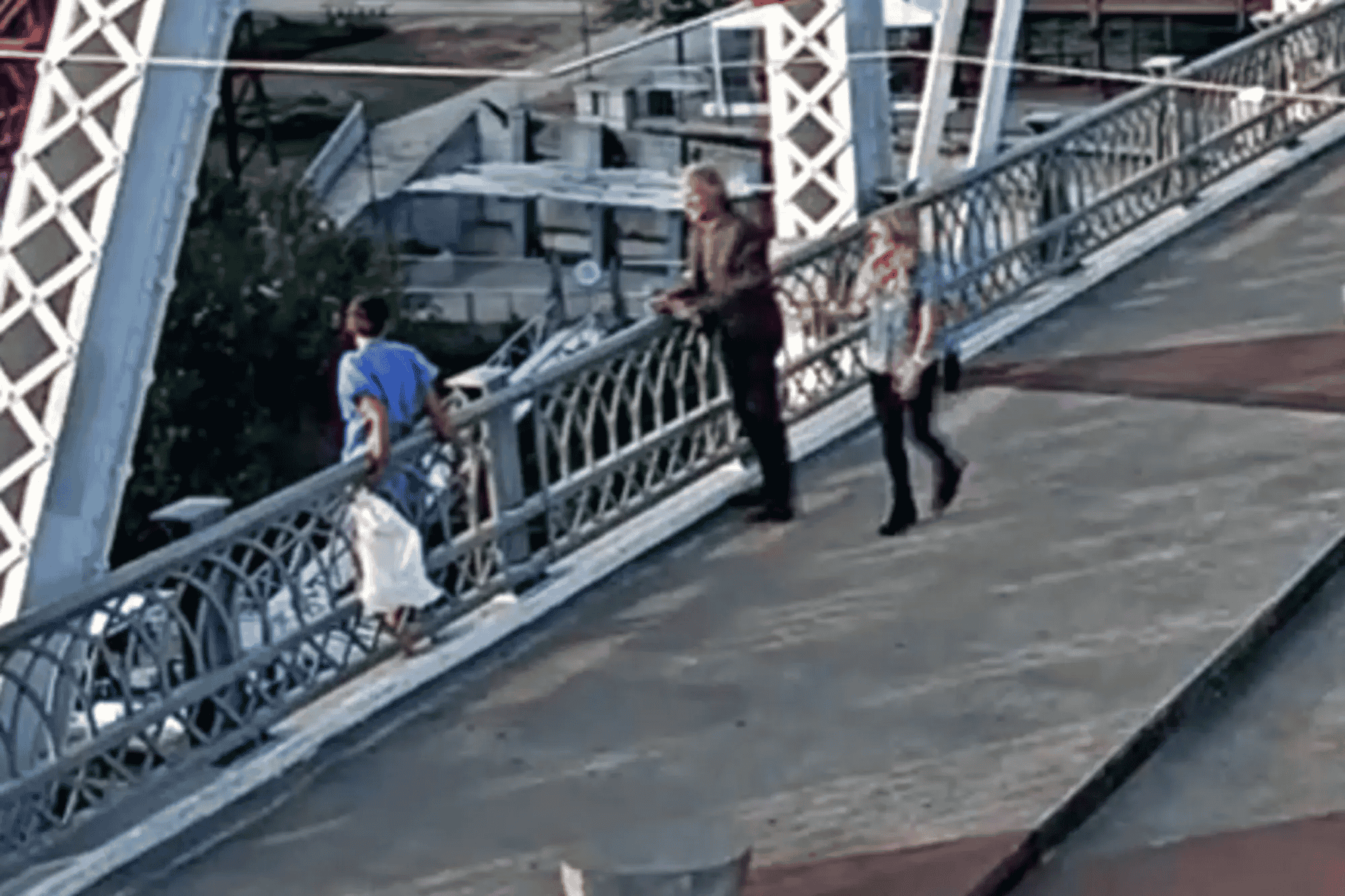 Jon Bon Jovi and a colleague talked the woman off the ledge. background